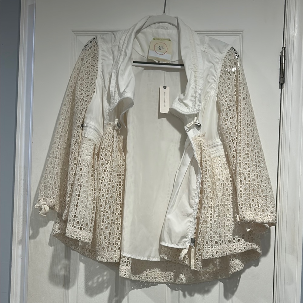 Elegant White Cape with Textured Design